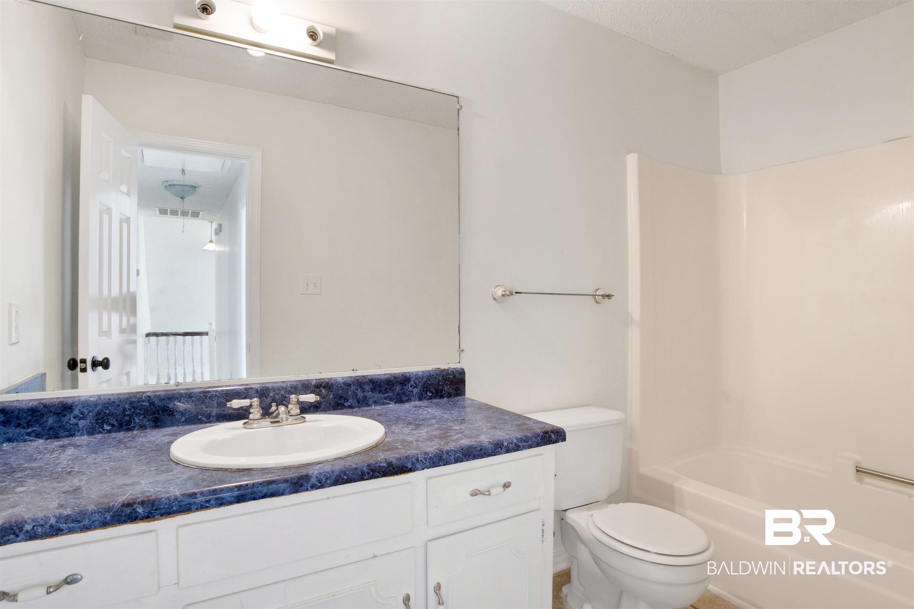 5480 Country Club Boulevard Theodore, AL 36582 - Photo 22 of 36 Full bathroom featuring toilet, shower combination, and vanity