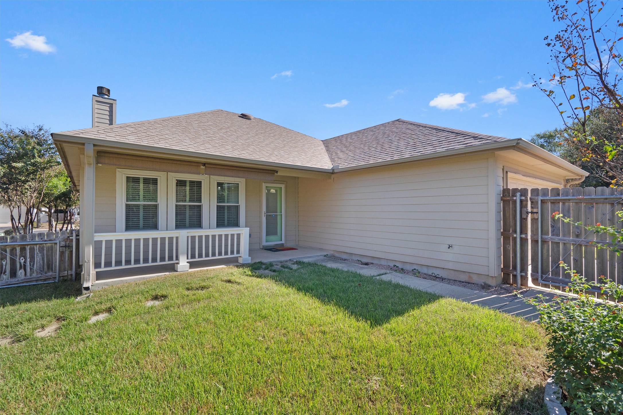 153 Hickory Lane Georgetown, TX 78633 - Photo 29 of 30 Exterior featuring light-colored siding and a covered porch with white railing