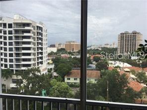 435 South Gulfstream Avenue, Unit 906 Sarasota, FL 34236 - Photo 11 of 22 a view of a tall building from a window