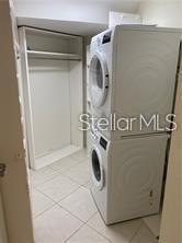 435 South Gulfstream Avenue, Unit 906 Sarasota, FL 34236 - Photo 12 of 22 a utility room with dryer and washer