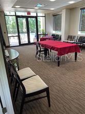 435 South Gulfstream Avenue, Unit 906 Sarasota, FL 34236 - Photo 13 of 22 a dining room with furniture and window