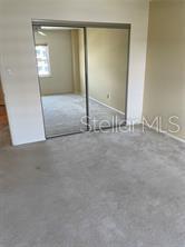 435 South Gulfstream Avenue, Unit 906 Sarasota, FL 34236 - Photo 7 of 22 an empty room with windows