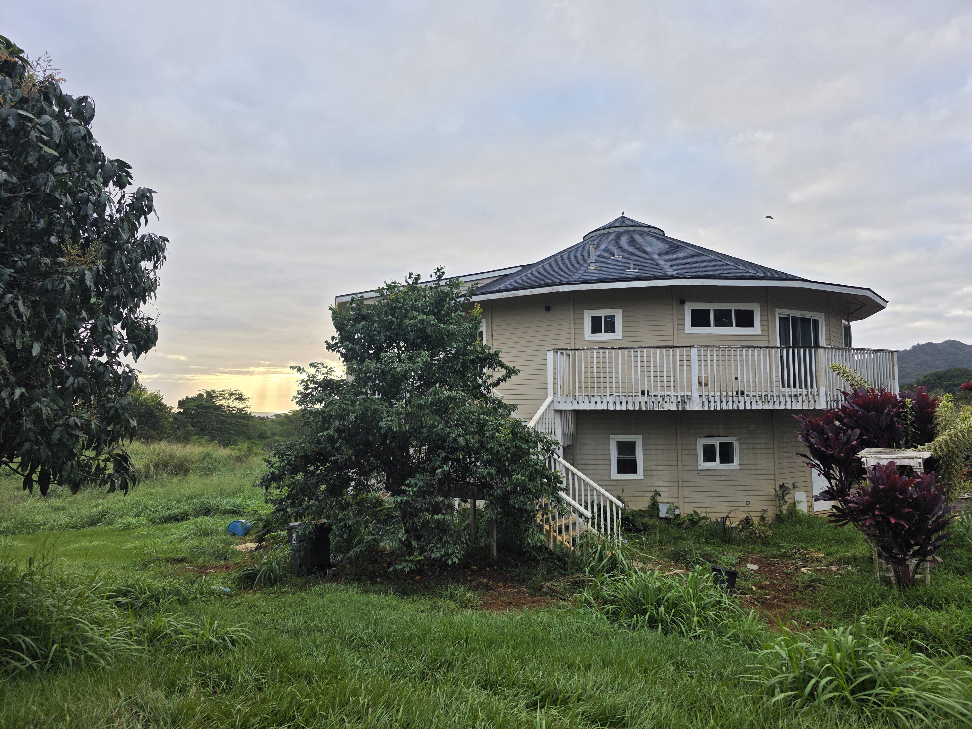 6469 L Kawaihau Road Kapaa, HI 96746 - Photo 4 of 12 a front view of a house with a yard