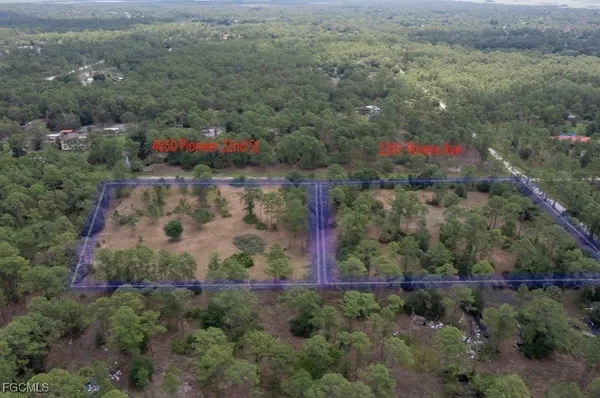 an aerial view of residential house and outdoor space
