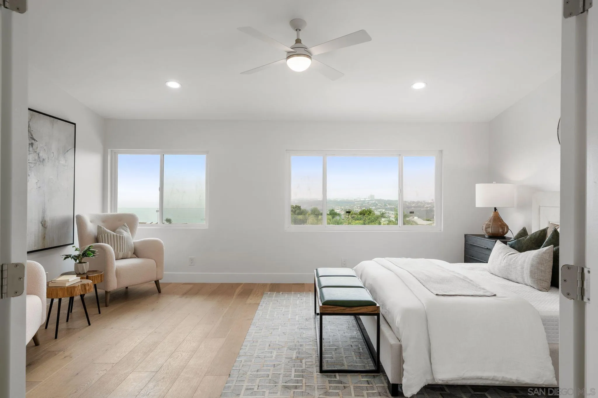 2364 Rue Adriane La Jolla, CA 92037 - Photo 16 of 27 a living room with furniture and a large window