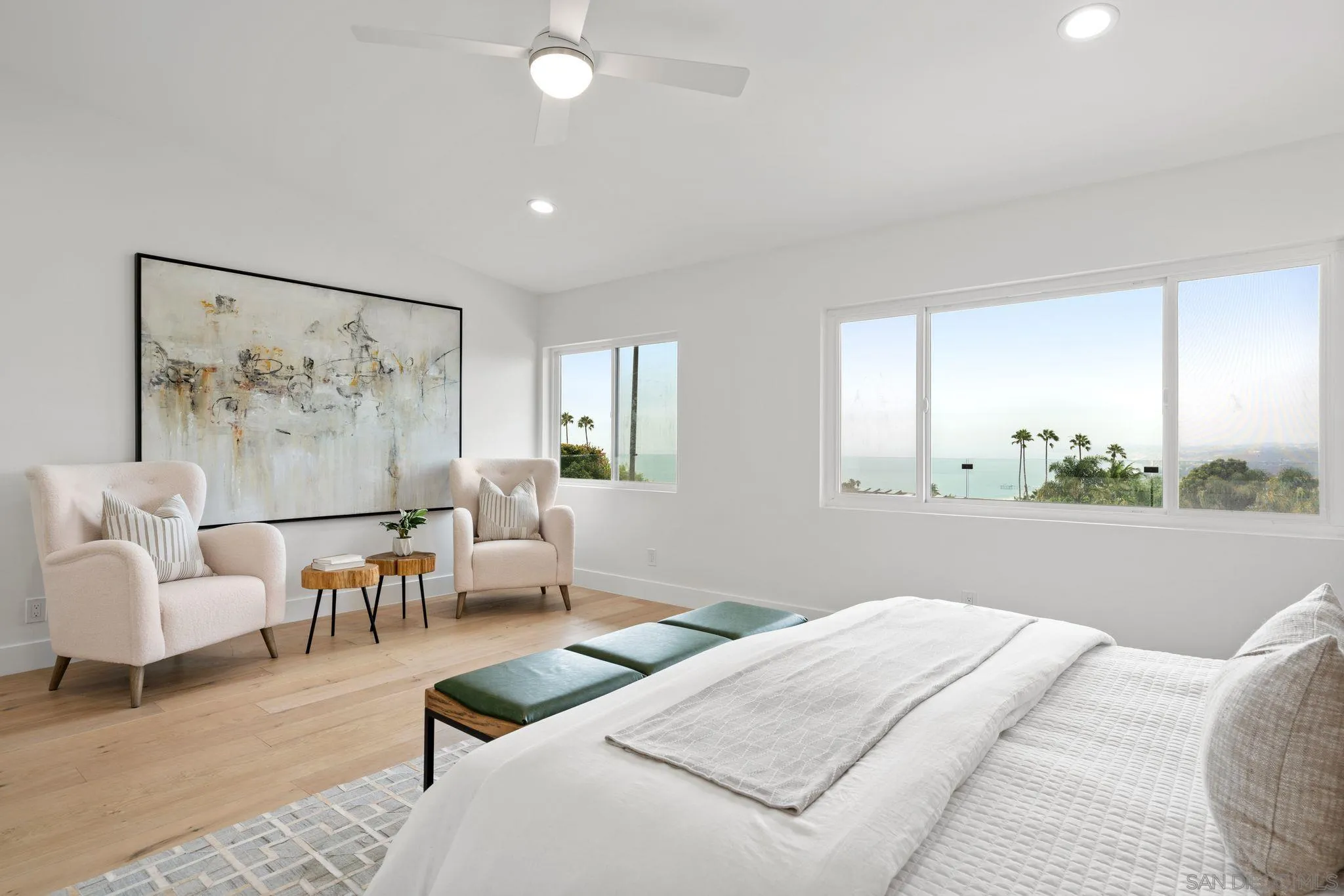 2364 Rue Adriane La Jolla, CA 92037 - Photo 17 of 27 a living room with furniture and a large window