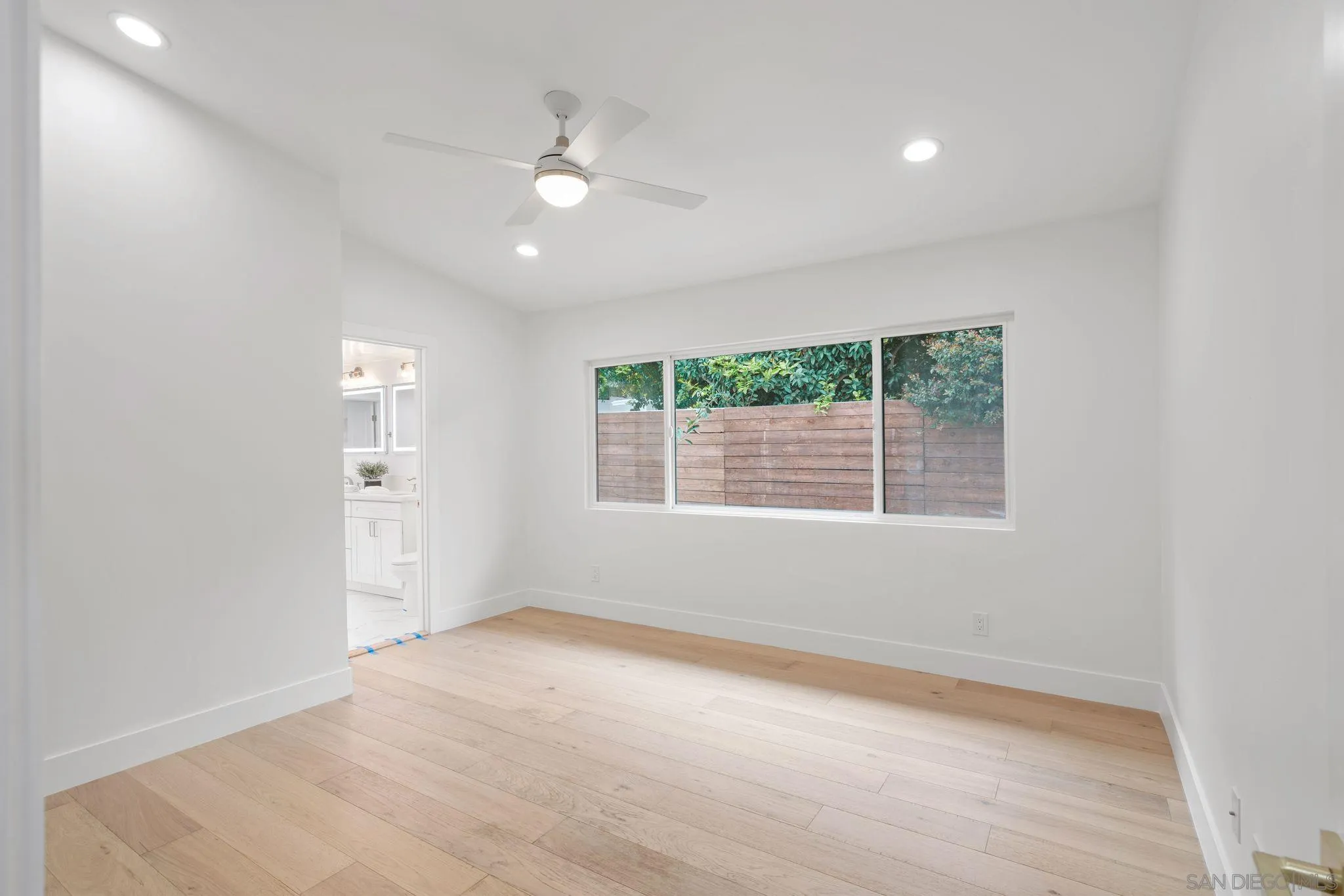 2364 Rue Adriane La Jolla, CA 92037 - Photo 19 of 27 a view of an empty room with a window