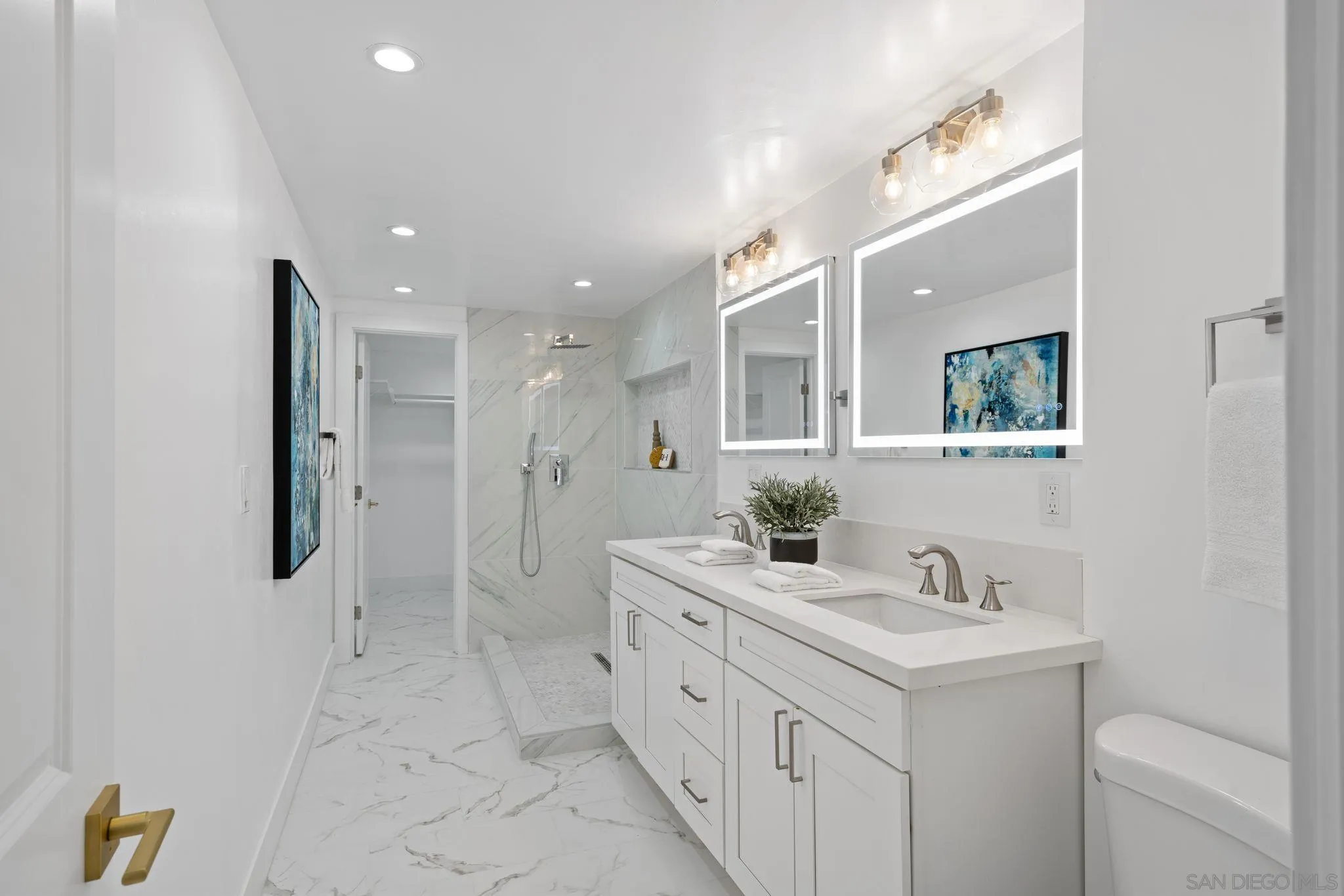 2364 Rue Adriane La Jolla, CA 92037 - Photo 20 of 27 a spacious bathroom with a double vanity sink mirror and shower