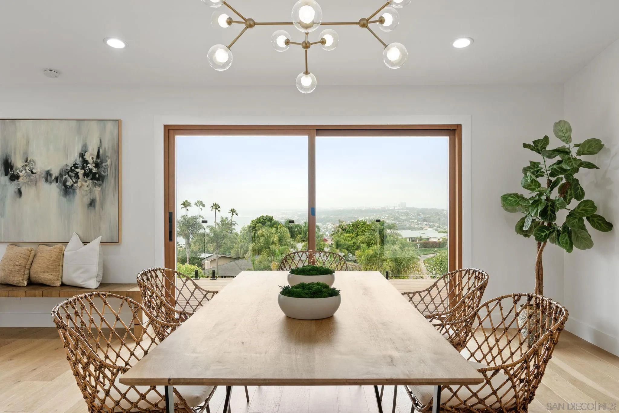 2364 Rue Adriane La Jolla, CA 92037 - Photo 4 of 27 a living room with furniture potted plant and a large window