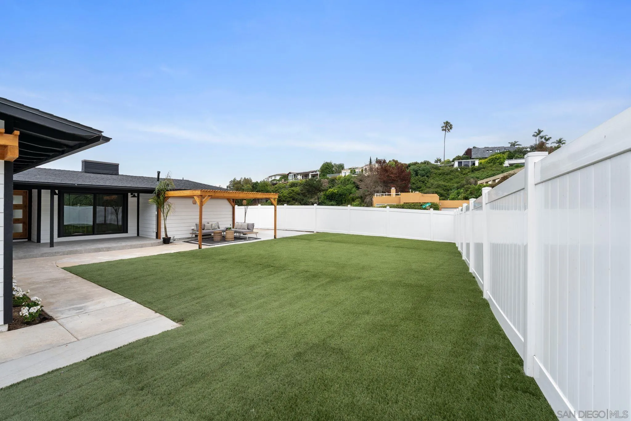 2364 Rue Adriane La Jolla, CA 92037 - Photo 5 of 27 a view of a back yard of the house