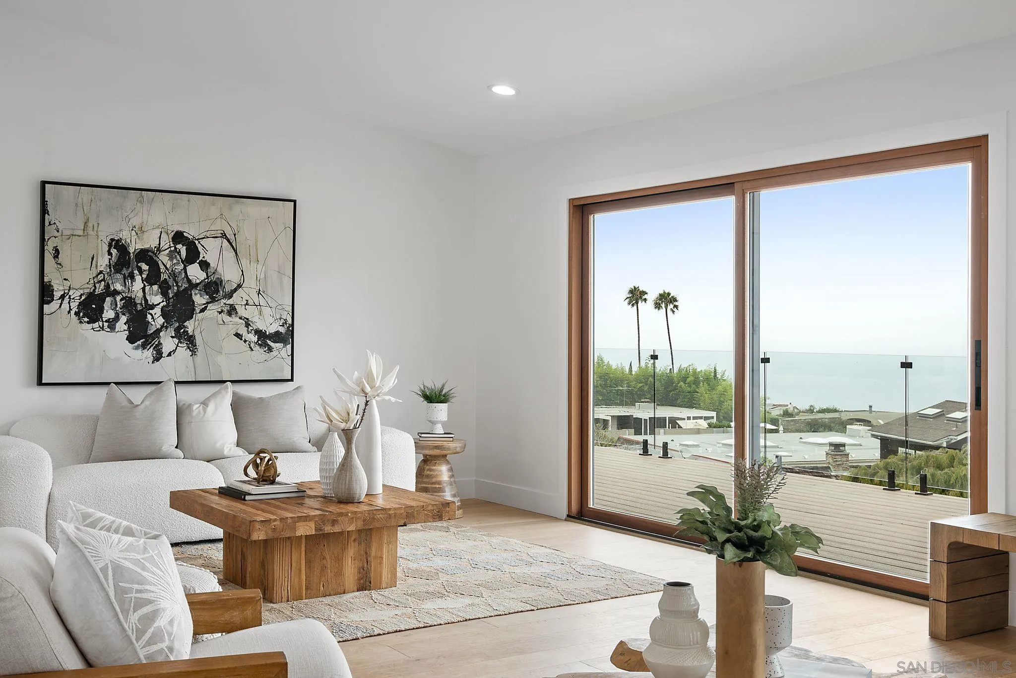2364 Rue Adriane La Jolla, CA 92037 - Photo 9 of 27 a living room with furniture and a large window