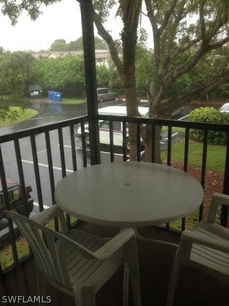 8061 Country Road, Unit 201 Fort Myers, FL 33919 - Photo 9 of 10 a view of balcony with furniture