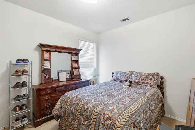 a bathroom with a double vanity sink mirror and double