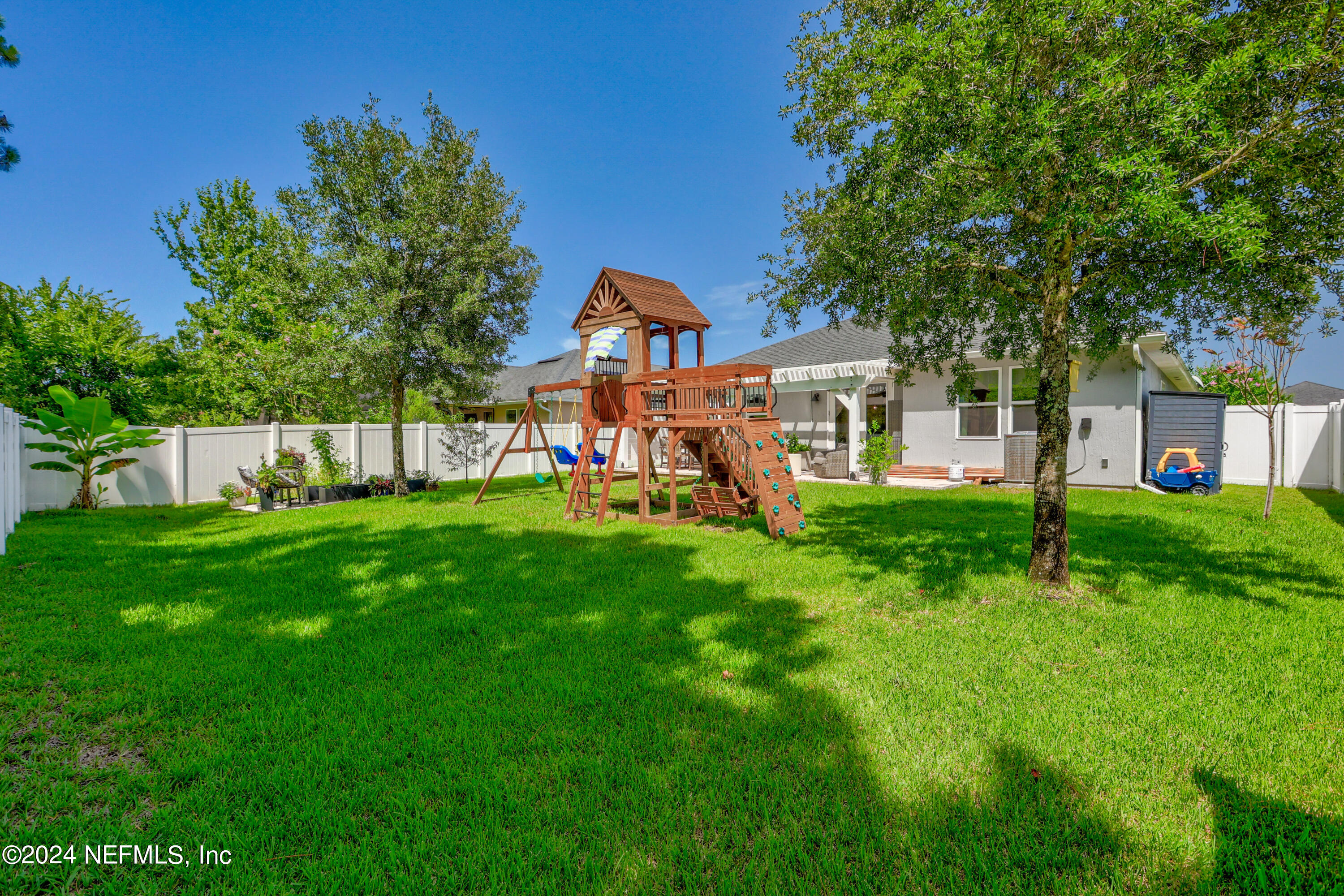 192 Peter Island Drive St. Augustine, FL 32092 - Photo 32 of 43 a view of a house with a yard