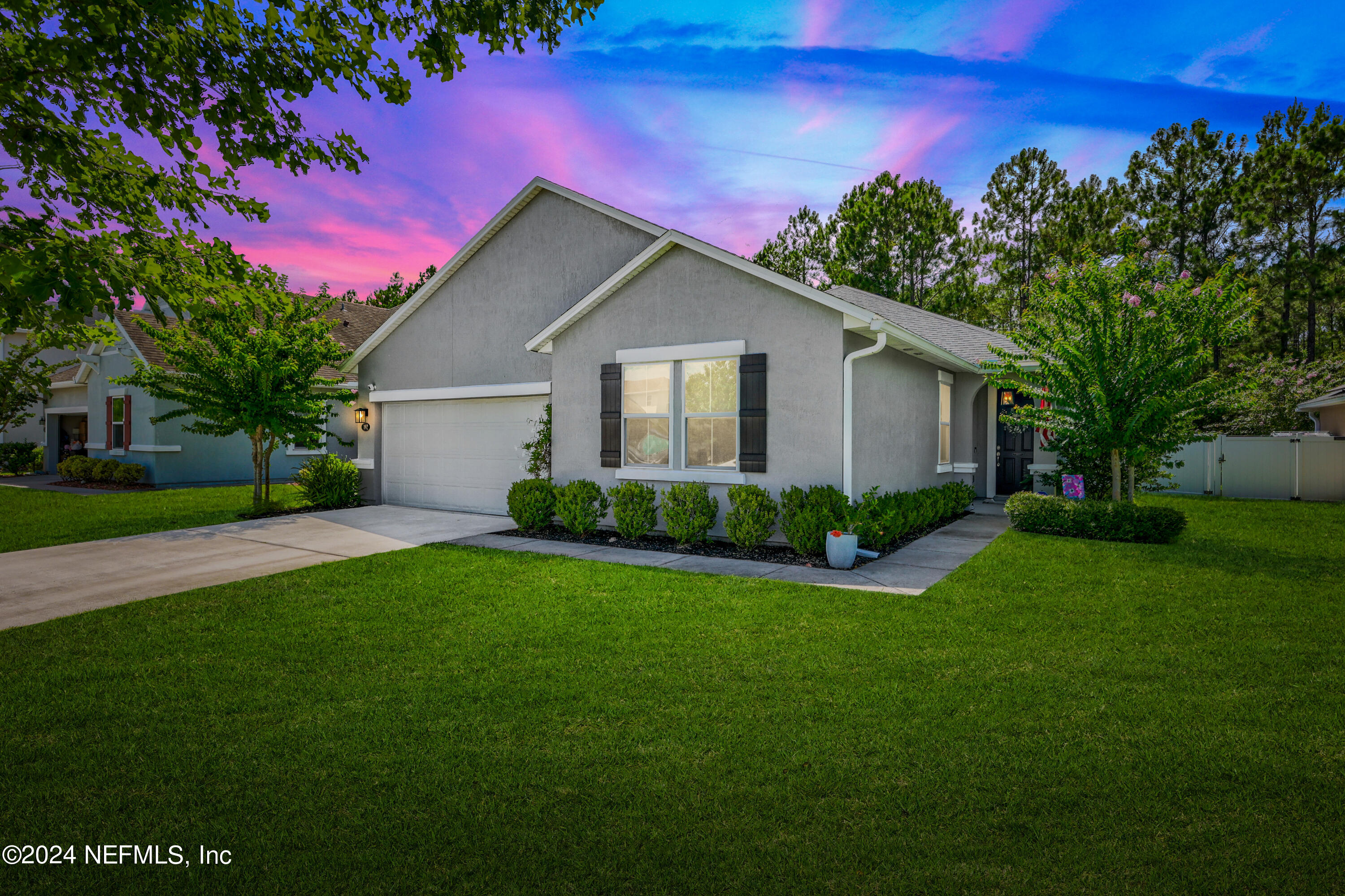 192 Peter Island Drive St. Augustine, FL 32092 - Photo 6 of 43 a front view of a house with garden