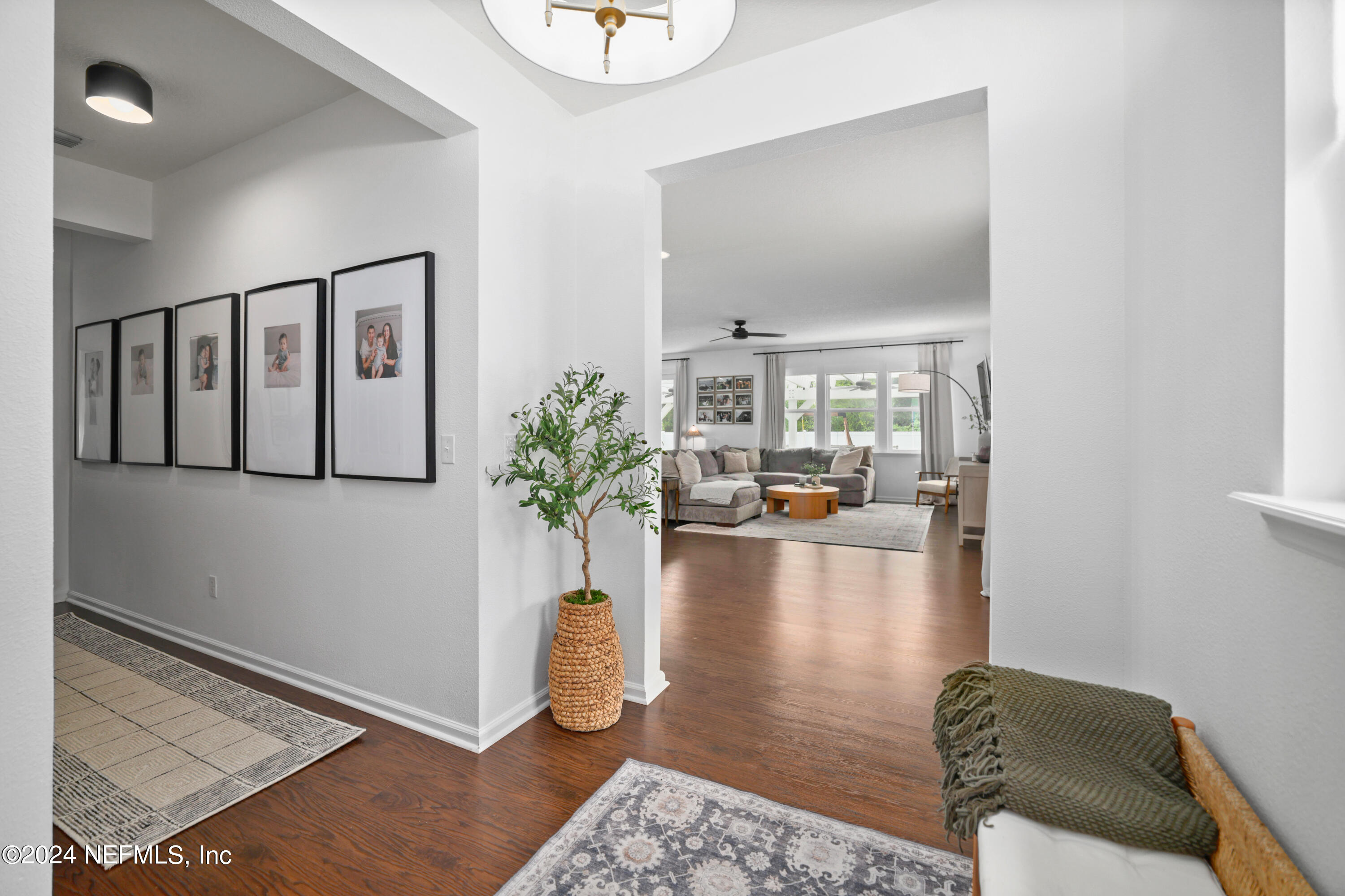 192 Peter Island Drive St. Augustine, FL 32092 - Photo 8 of 43 a living room with furniture and a flat screen tv