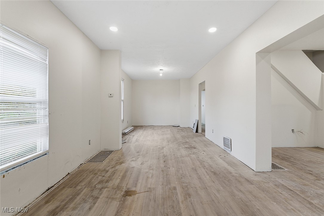 1206 Diagonal Road Akron, OH 44320 - Photo 9 of 28 Empty room with light wood-type flooring and recessed lighting