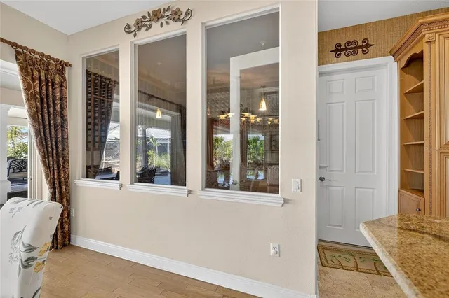a view of entryway with wooden floor and stair