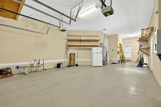 a view of a swimming pool with outdoor seating