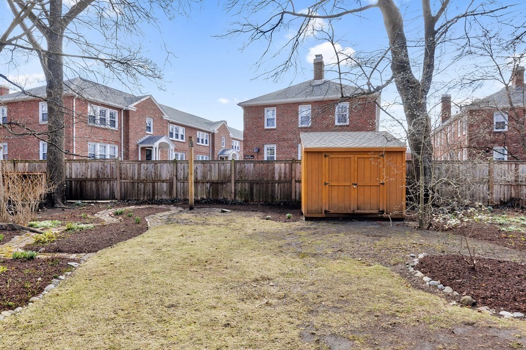 10 Shady Hill Square Cambridge, MA 02138 - Photo 11 of 37 a view of a house with a yard covered with snow in the outdoor space
