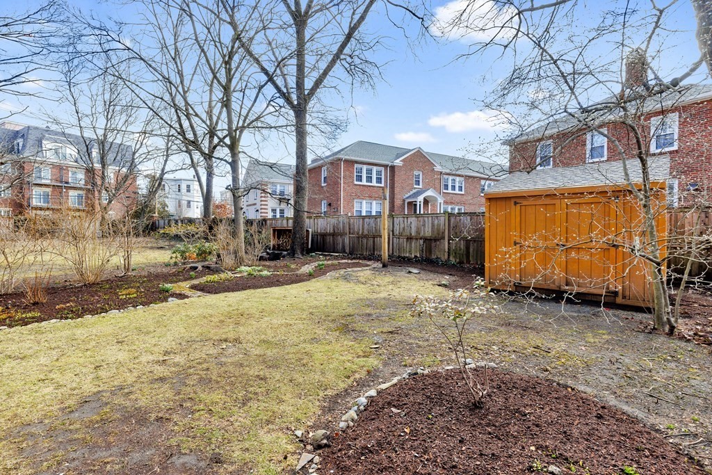 10 Shady Hill Square Cambridge, MA 02138 - Photo 12 of 37 a view of a building with a yard