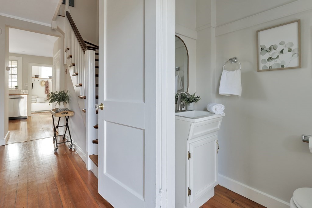 10 Shady Hill Square Cambridge, MA 02138 - Photo 15 of 37 a view of a hallway with wooden floor and a living room