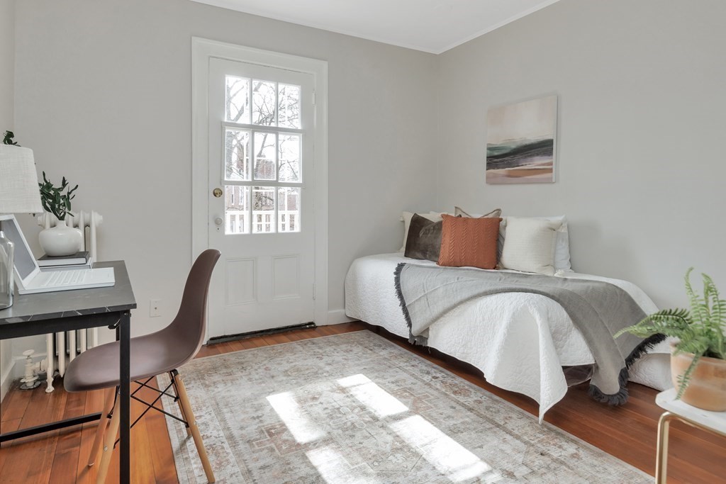 10 Shady Hill Square Cambridge, MA 02138 - Photo 16 of 37 a bedroom with a bed chair and window