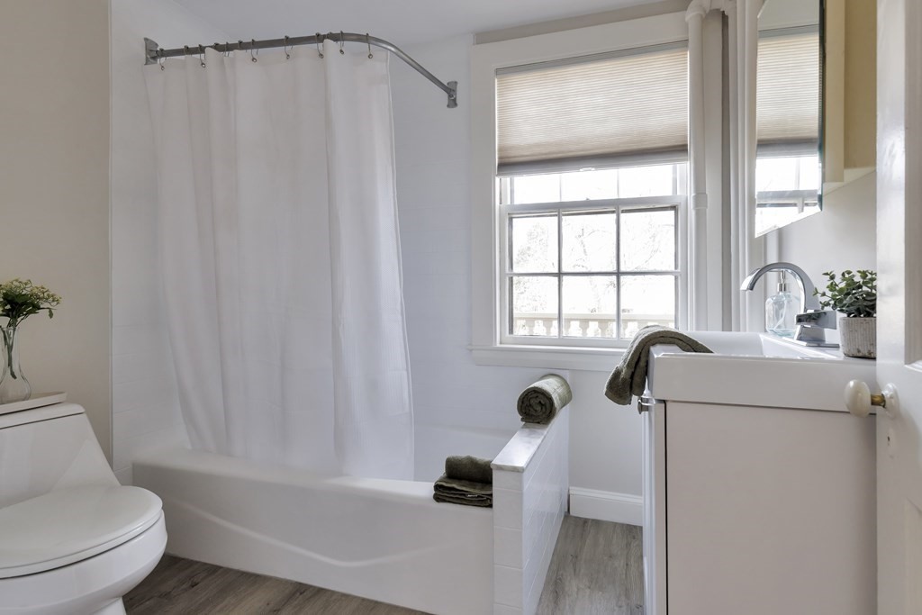 10 Shady Hill Square Cambridge, MA 02138 - Photo 18 of 37 a bathroom with a sink and a toilet