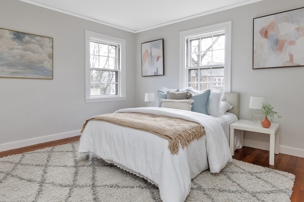 10 Shady Hill Square Cambridge, MA 02138 - Photo 19 of 37 a spacious bedroom with a bed and a window