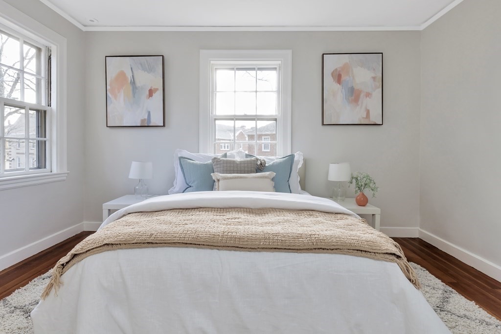 10 Shady Hill Square Cambridge, MA 02138 - Photo 20 of 37 a bedroom with a bed and a window