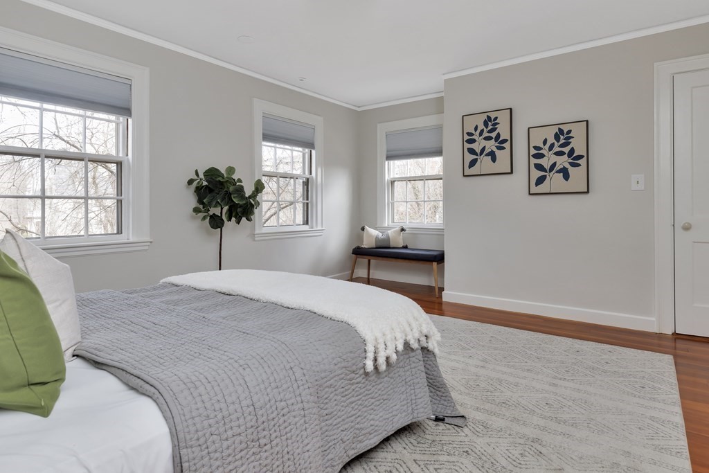 10 Shady Hill Square Cambridge, MA 02138 - Photo 22 of 37 a bedroom with a bed and a large window