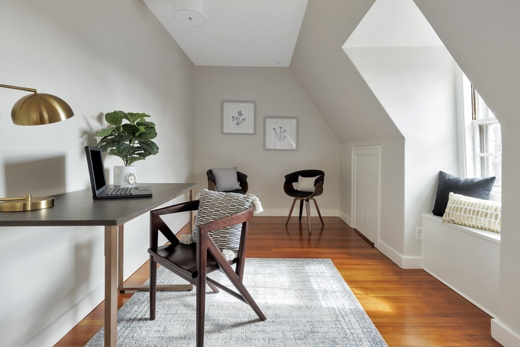 10 Shady Hill Square Cambridge, MA 02138 - Photo 28 of 37 a living room with furniture and a potted plant
