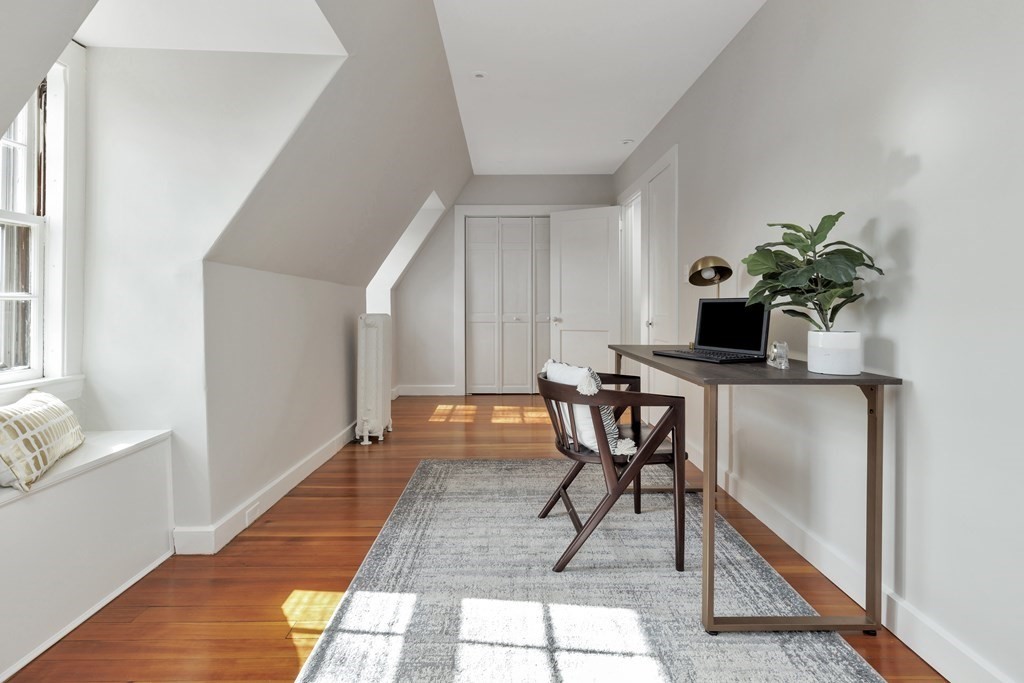 10 Shady Hill Square Cambridge, MA 02138 - Photo 29 of 37 a workspace with furniture and a potted plant