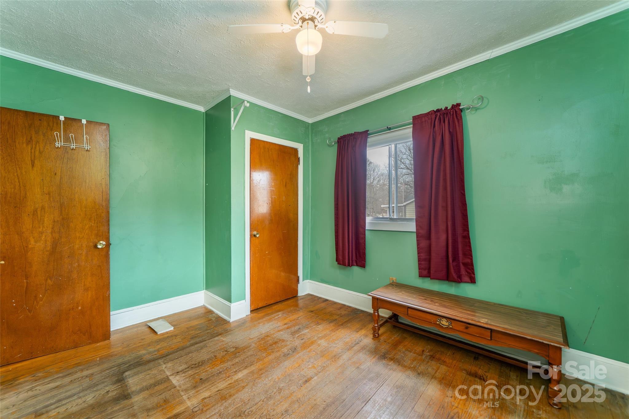298 School Road East Asheville, NC 28803 - Photo 20 of 27 a view of a room with furniture and a large window
