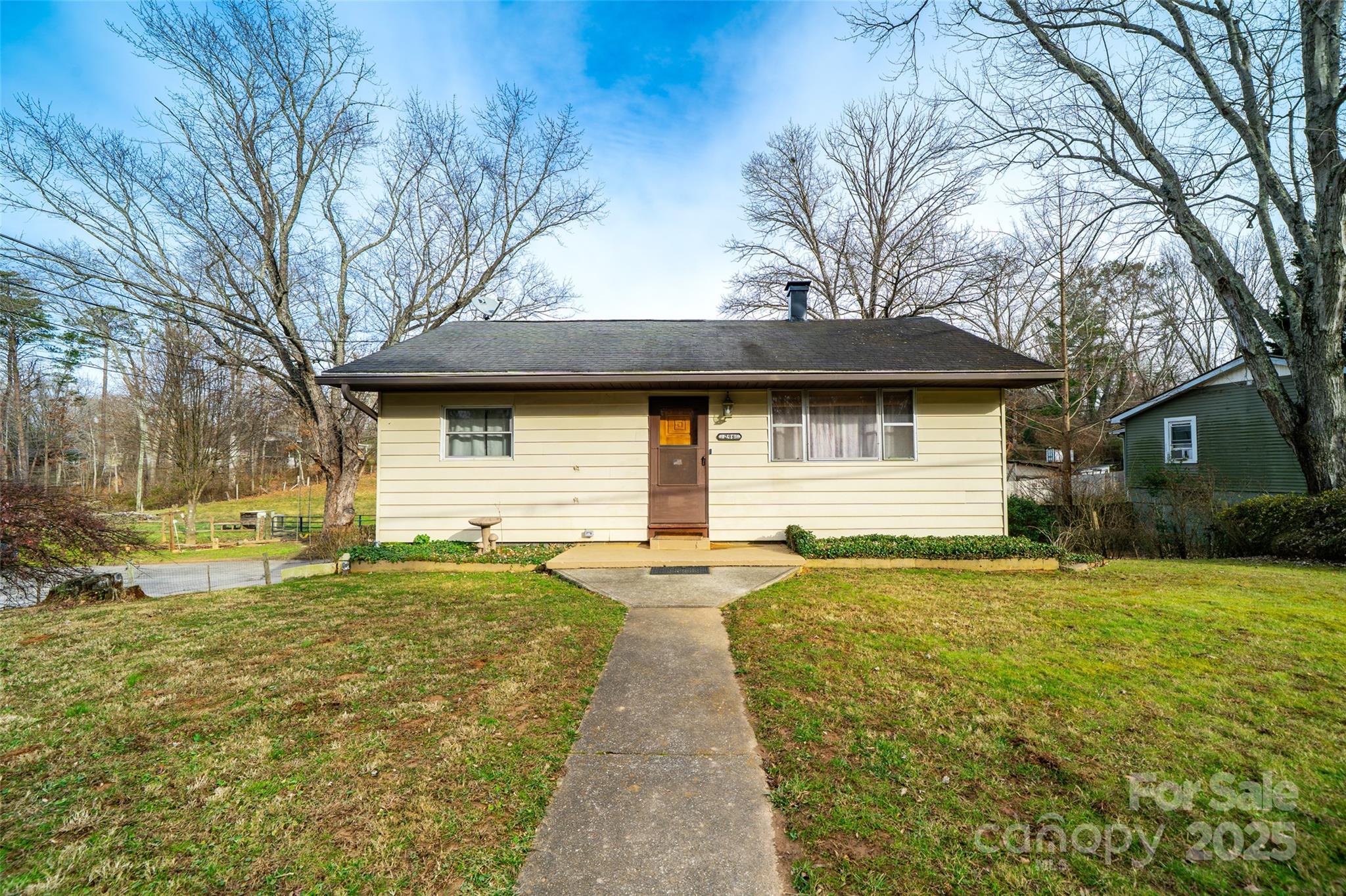 298 School Road East Asheville, NC 28803 - Photo 2 of 27 a view of a house with a yard