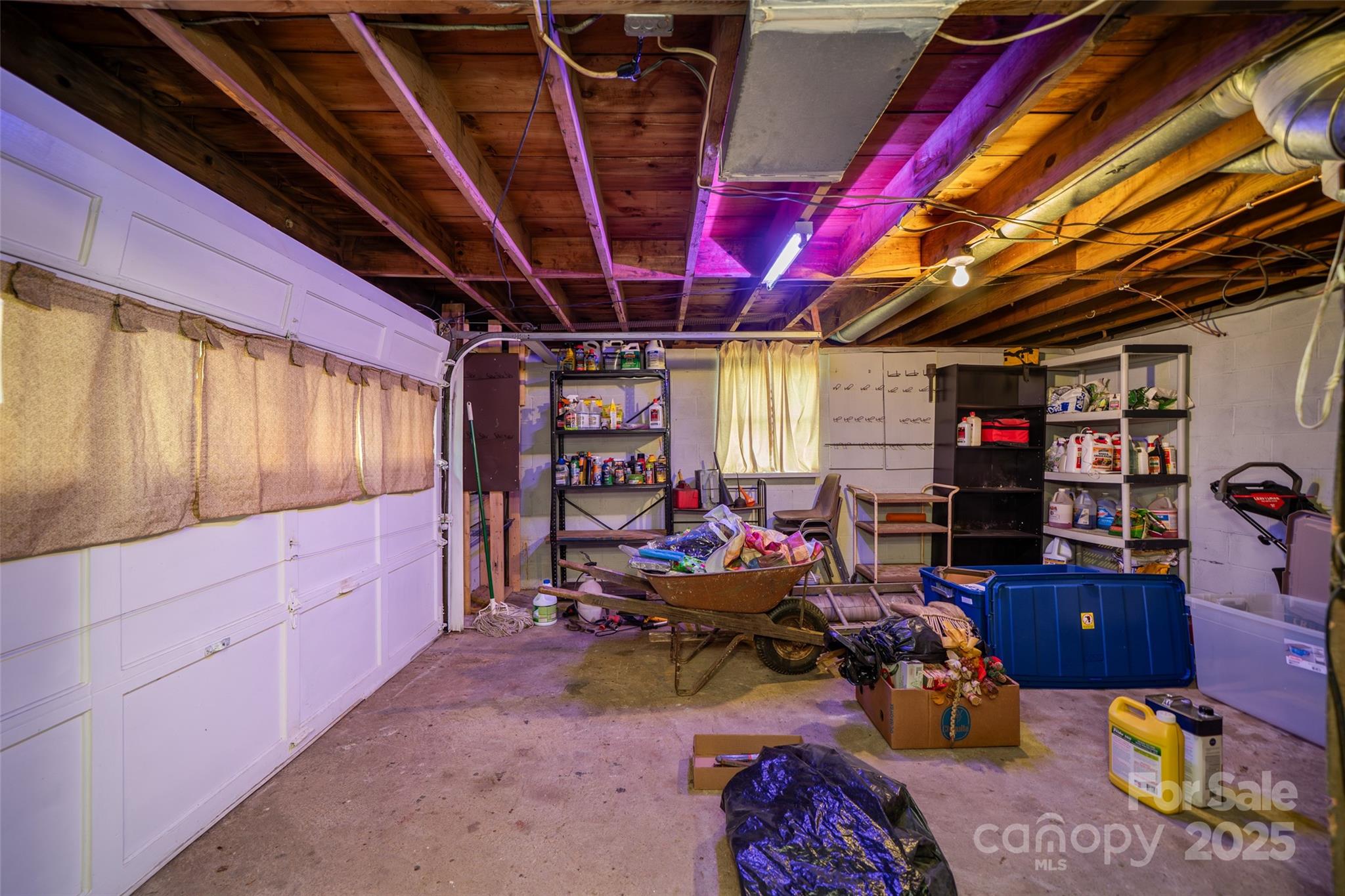 298 School Road East Asheville, NC 28803 - Photo 23 of 27 a garage with a white stove top oven and a dishwasher