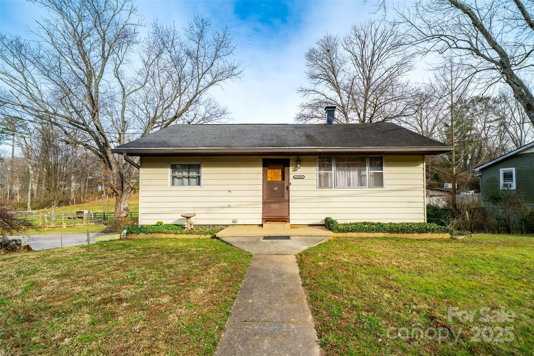 298 School Road East Asheville, NC 28803 - Photo 26 of 27 a front view of house with yard