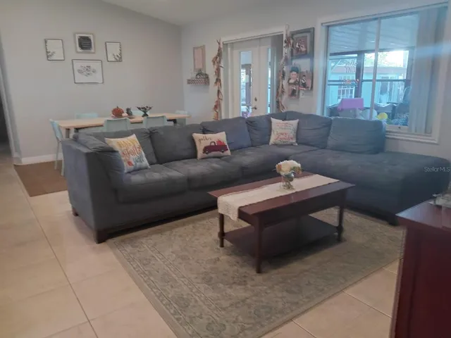 a living room with furniture and a couch