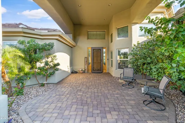 a view of a house with a yard and garage