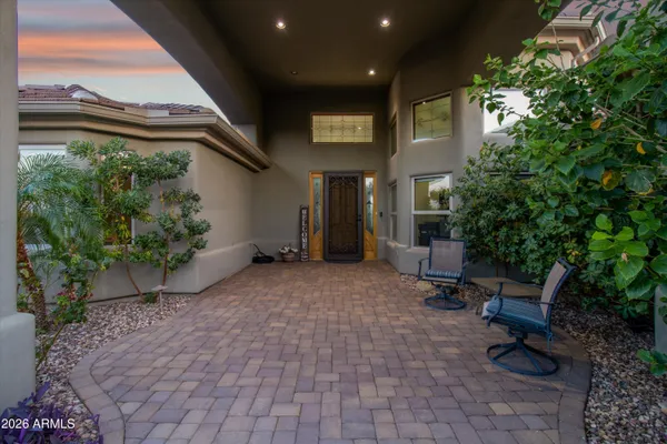 a view of a backyard of the house