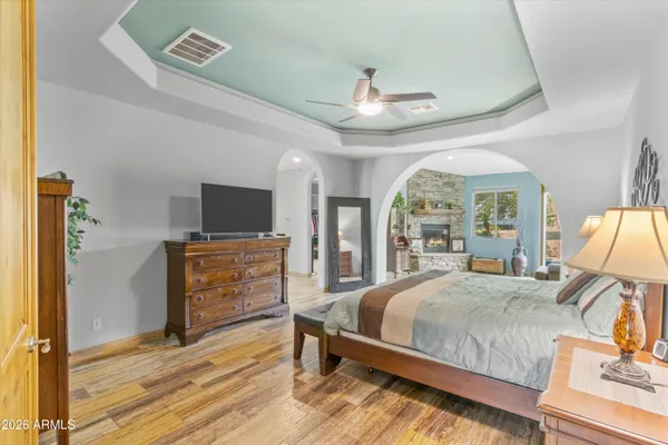 a view of a house with sitting area and garden