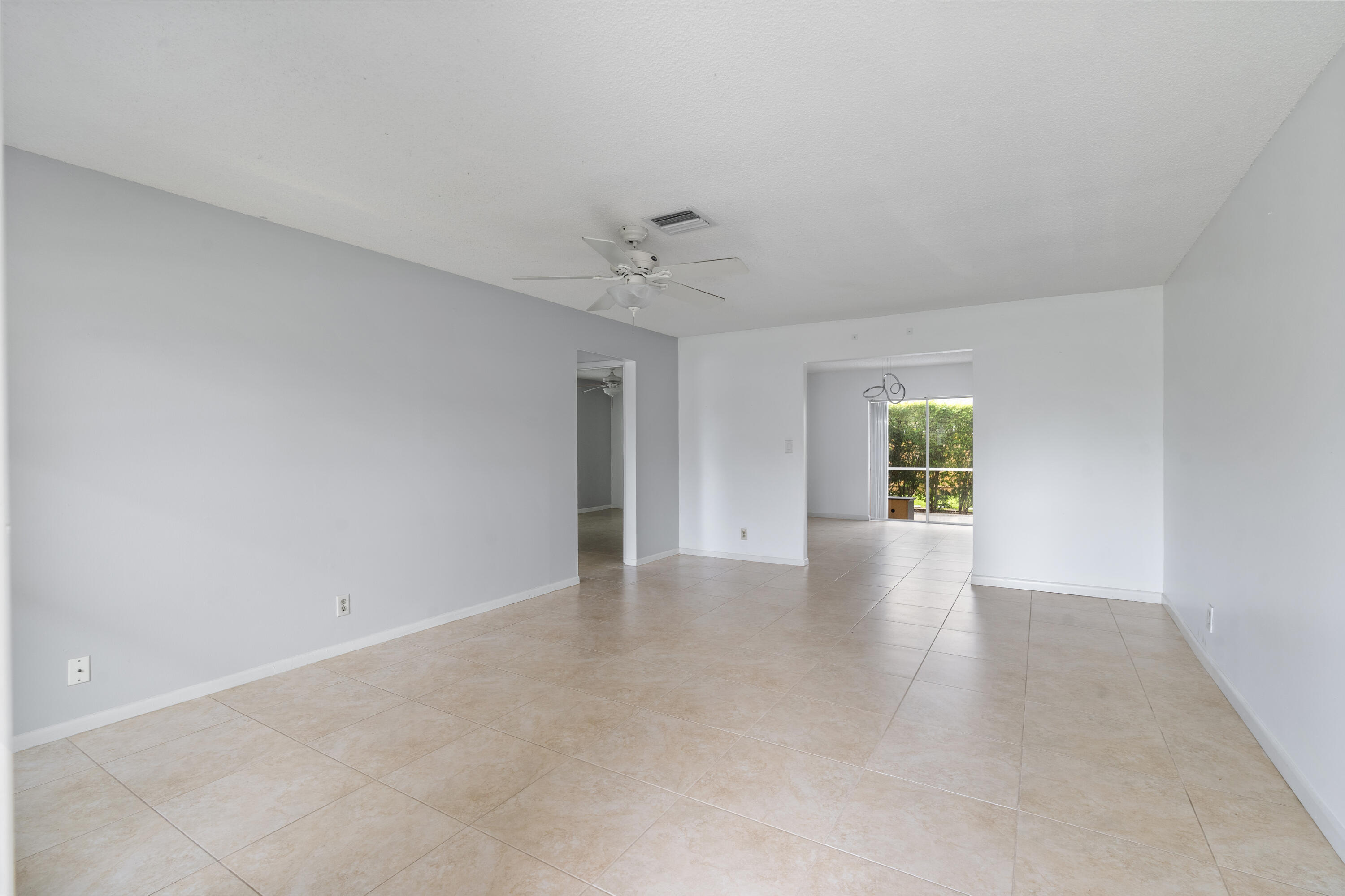 22707 Southwest 64th Way Boca Raton, FL 33428 - Photo 14 of 22 a view of an empty room with a window