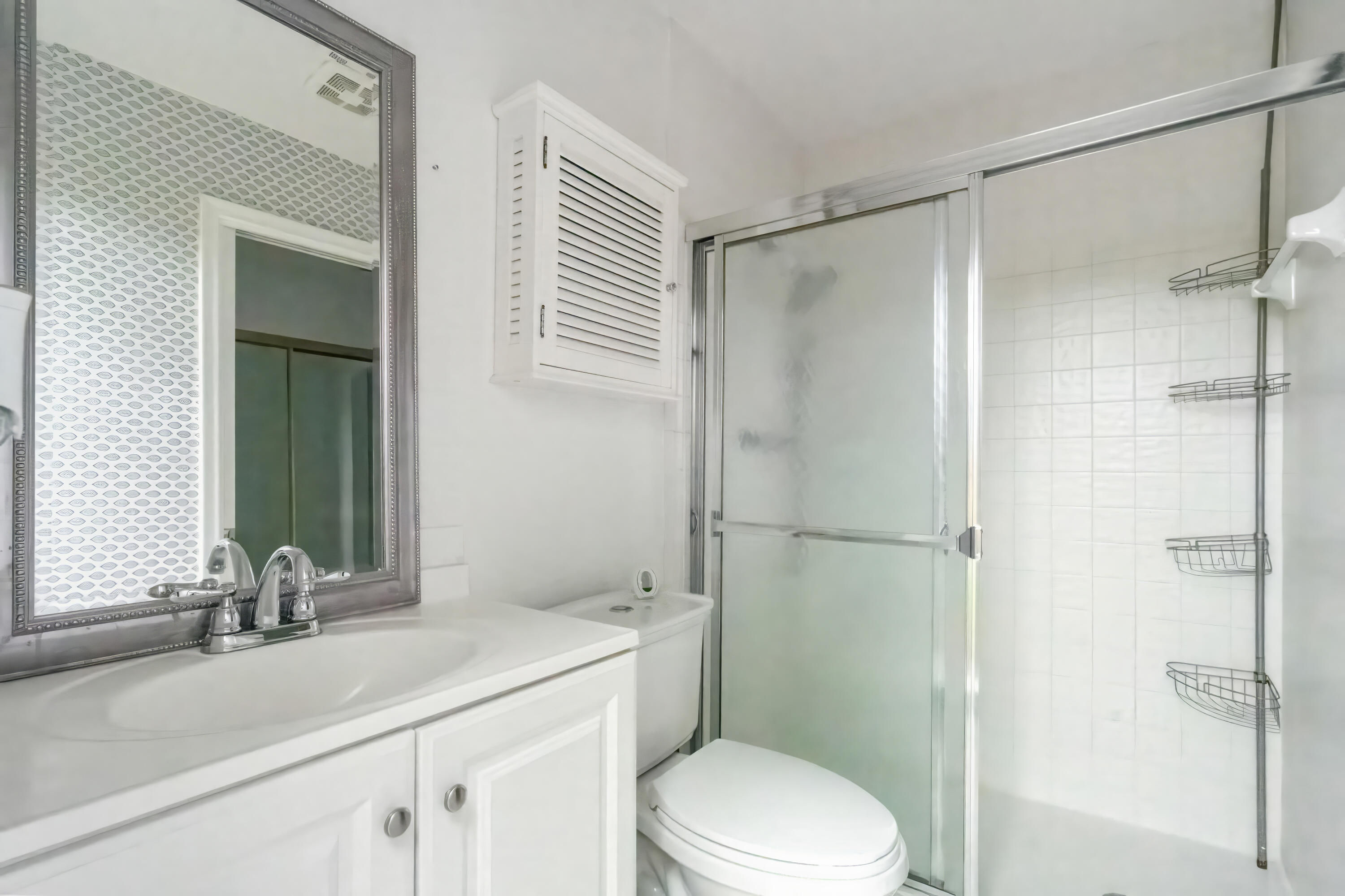 22707 Southwest 64th Way Boca Raton, FL 33428 - Photo 18 of 22 a bathroom with a sink a toilet and shower