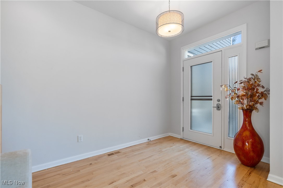 711 University Road Cleveland, OH 44113 - Photo 5 of 36 Foyer with light hardwood / wood-style floors
