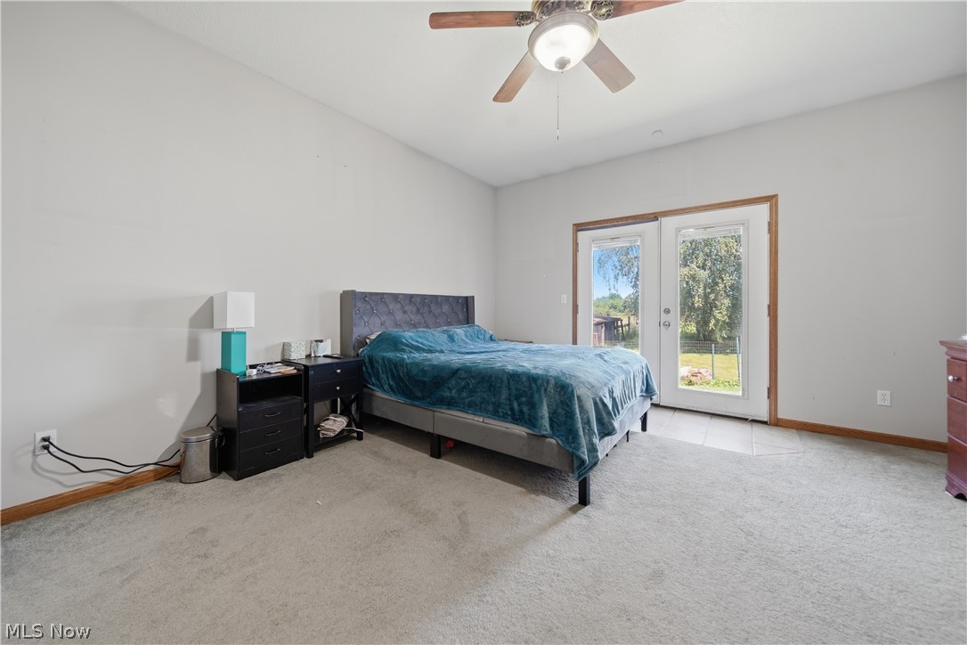 12159 Lawndell Road Southwest Beach City, OH 44608 - Photo 18 of 49 Room featuring light gray walls, a sloped ceiling, and light gray carpet