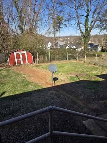 a view of a yard with an outdoor space