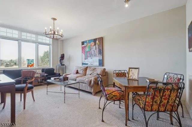 a bathroom with a toilet a sink and a mirror