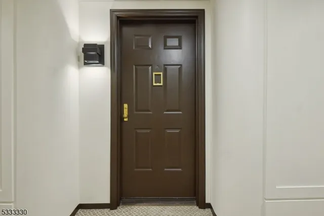 a view of hallway with livingroom