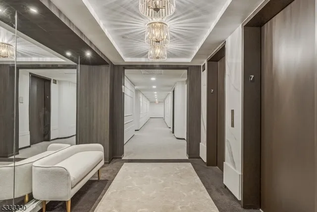 a view of a hallway with closet