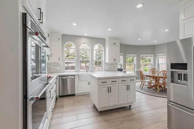 a view of a backyard and a yard